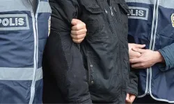 Cumhurbaşkanı'nın afişine küfürlü ifadeler yazdı, tutuklandı