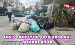 Grev sürüyor: Çöp dağları sokaklarda
