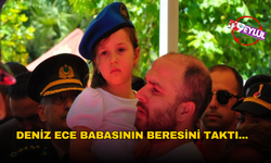 Deniz Ece babasının beresini taktı