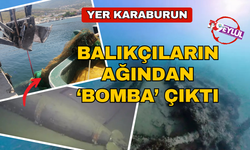 Karaburun'da balıkçıların ağına denizaltı torpidosu takıldı.