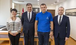 Tarihi başarılara imza atan Tuna, Başkan Tugay’la buluştu