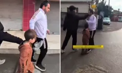 Çocuğunun gözü önünde babasını tekme tokat dövdü