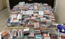 İzmir'de zehir tacirlerine ağır darbe: Lastiklerin içinden binlerce paket kaçak sigara çıktı