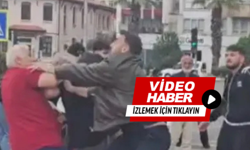 Gazeteci eşinin gözü önünde darbedildi