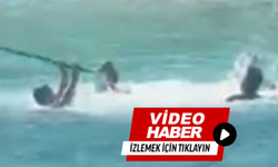 Denizin ortasında sopalı kavga