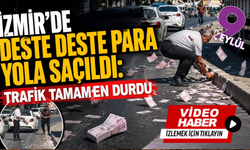 İzmir’de deste deste para yola saçıldı: Trafik tamamen durdu