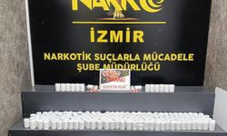 İzmir'in Torbalı ilçesinde toprağa gömülü binlerce sentetik ecza ele geçirildi