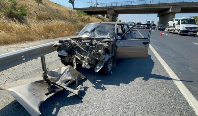 İş makinesine çarpan otomobilin sürücüsü yaralandı