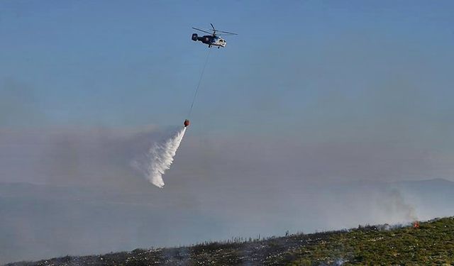 Adana'da yangına müdahale için barajdan su alan helikopter düştü