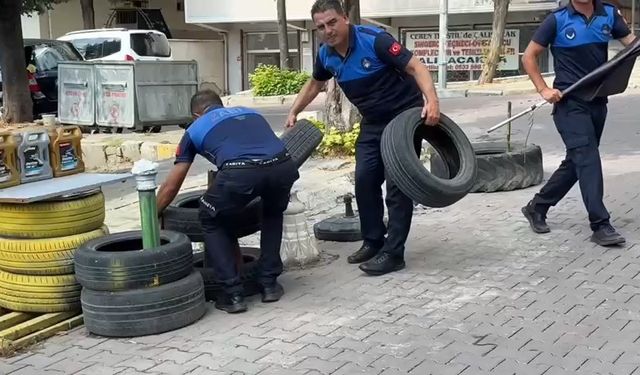 Avcılar'da kaldırımları işgal eden yüzlerce duba, lastik, palet, flama toplandı