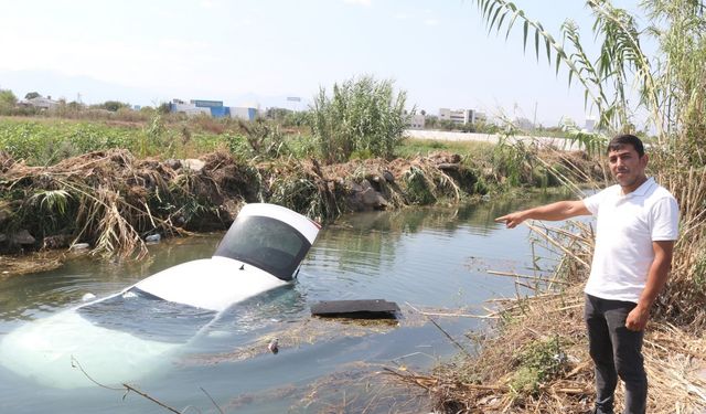 Virajı geniş alınca otomobille kanala uçtu