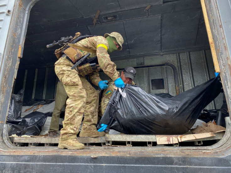 Ukrainian Servicemen Loading Bodies Russian Soldiers