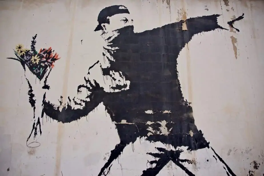 Banksy – Love Is In The Air Flower Thrower 2005 Ash Salon Street Bethlehem West Bank 1 Scaled 1 1536X1025
