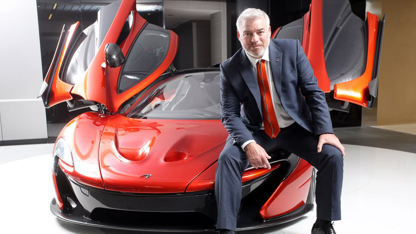 Frank Stephenson Design Director Of Mclaren Automotive Poses With The P1 Supercar